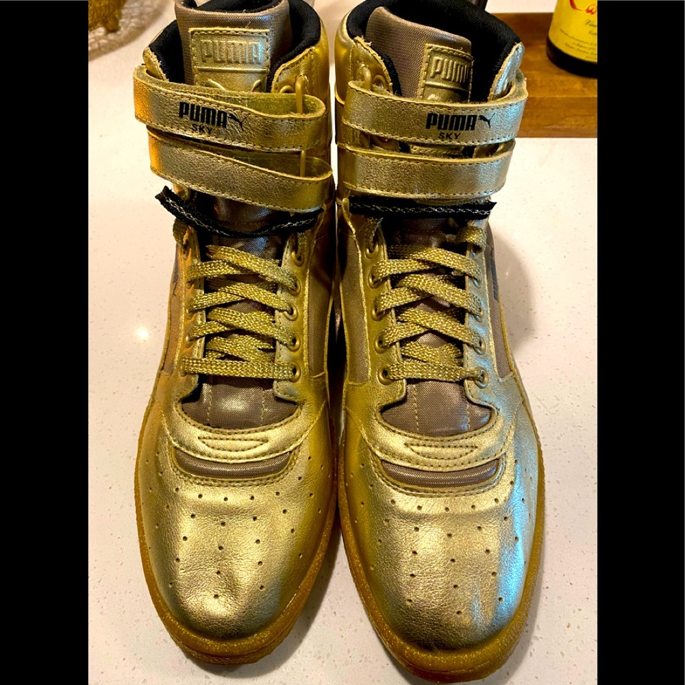 Gold PUMA Hi Top sneakers 11